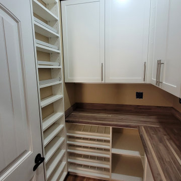 Walk in pantry with built in wine rack
