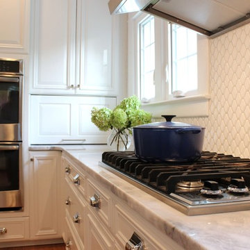 Transitional Kitchen With White & Gray Cabinets and Quartzite Countertop
