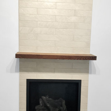 Tile wall install for fireplace