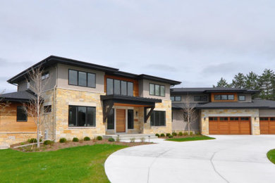 Example of a trendy home design design in Milwaukee