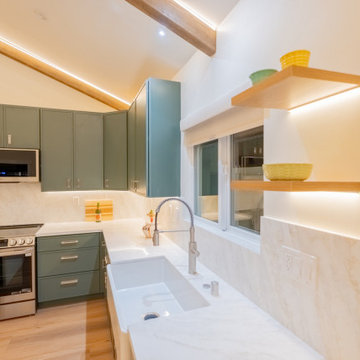 Architectural Vaulted ADU Kitchen with Seamless Quartz & Designer Lighting