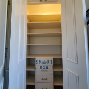 Clean Finish Walk- In and Reach-In Closet designed By Smart Closets