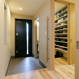 他の地域のコンテンポラリースタイルのおしゃれな玄関の写真