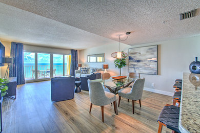 Example of a beach style dining room design in Tampa