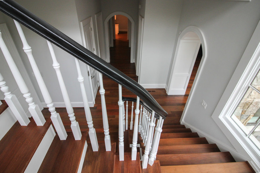 Powerful Impression by Floating Staircase in Suburban Foyer