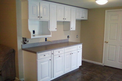 Elegant basement photo in Other