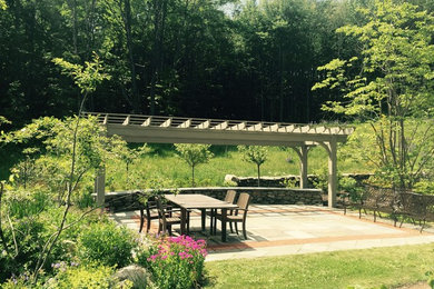 Photo of a mid-sized rustic backyard formal garden in Richmond.