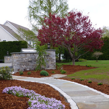 Bluestone Patio with Granite Cobblestone walls