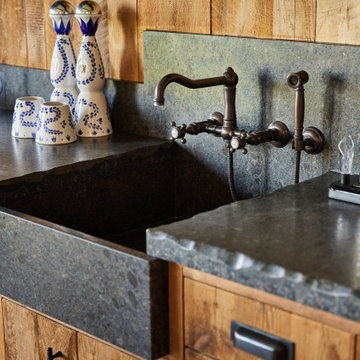 Weathered Antique Paneling and Cabinetry in Rustic Home Bar