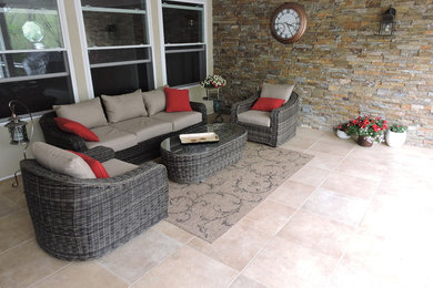Patio - backyard tile patio idea in Chicago