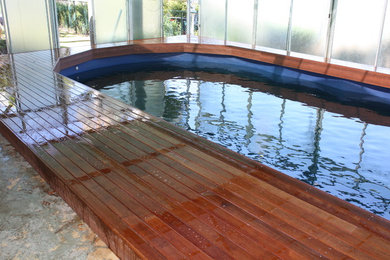 Large modern indoor aboveground pool in Gold Coast - Tweed with decking.