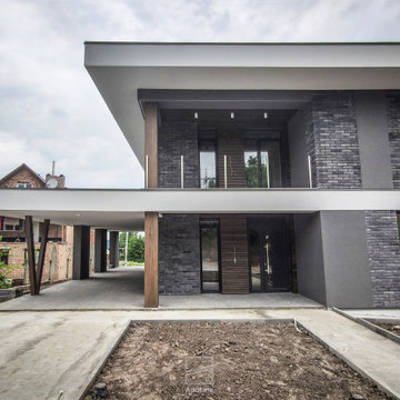 Modern two-story house with a terrace