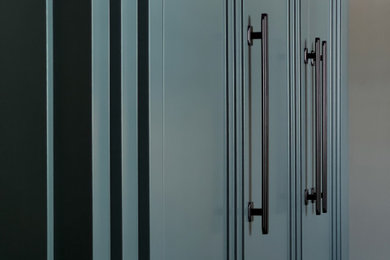 Large modern wardrobe in London with carpet.