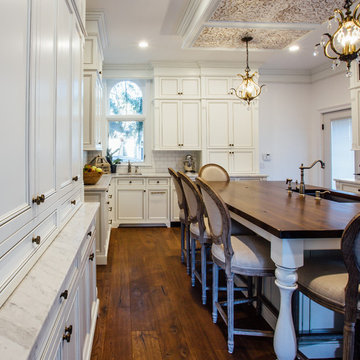 White Glazed Kitchen with Walnut Island Top
