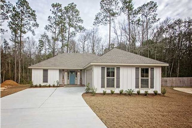 Mid-sized craftsman white one-story wood exterior home idea in Miami with a shingle roof