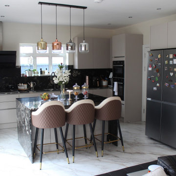 Elegant Modern Kitchen with Black Granite Island by Kudos Interior Designs