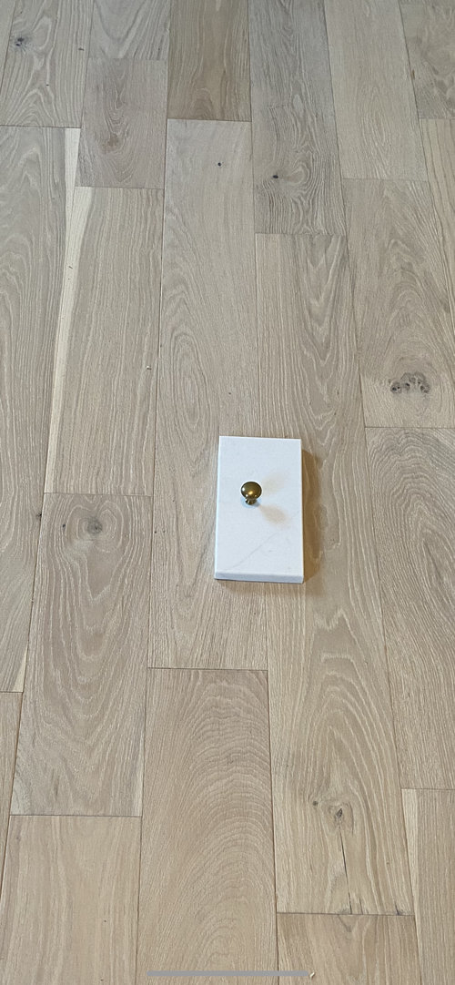 Has anyone used Tumbled White Bronze hardware by Emtek? Any photos?