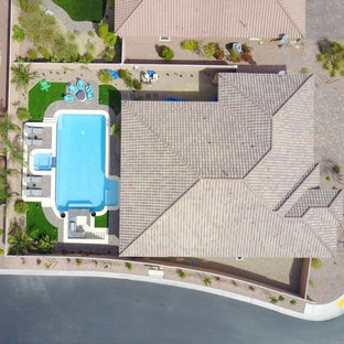 ラスベガスの大きいL型トラディショナルスタイルのおしゃれなプール (レンガ敷き) の写真