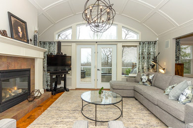 Example of a mid-sized trendy formal and enclosed dark wood floor and brown floor living room design in Calgary with white walls, a standard fireplace, a tile fireplace and a tv stand