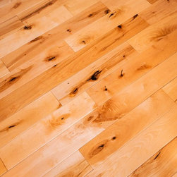 Hardwood flooring is 3 1/2" Solid Birch - Hardwood Flooring