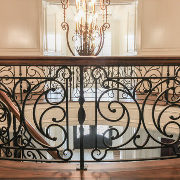 Project #74 | Circular Staircase with Hand-Forged Metal Panels