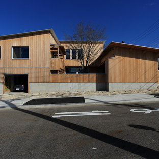 名古屋の北欧スタイルのおしゃれな家の外観 (木材サイディング、片流れ屋根、戸建、金属屋根) の写真