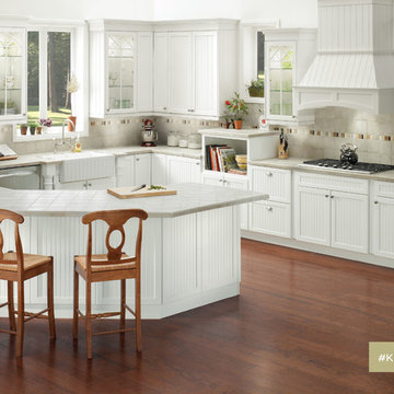 KraftMaid: White Kitchen with Curved Kitchen Island