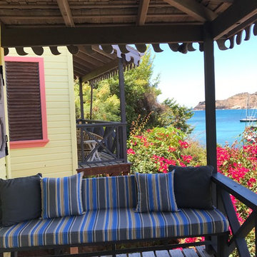 Custom glider cushions and pillows brighten outdoor patio space