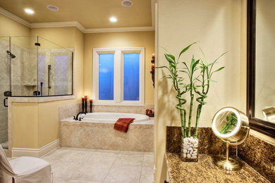 Inspiration for a mid-sized timeless master drop-in bathtub remodel in Austin