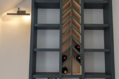 Inspiration for a contemporary wine cellar in Surrey.