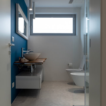 Abitazione privata in stile moderno con pavimento in resina