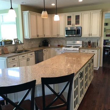 cabinet refacing--antique white with brown glaze,  new backsplash