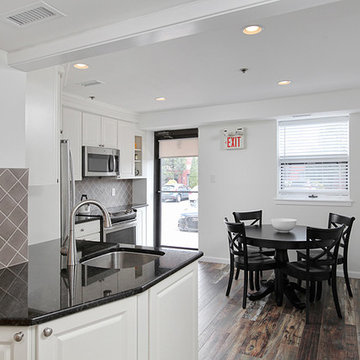 Cherry Hill, NJ: Open Office Kitchen with Diagonal Fridge and Rustic Floors
