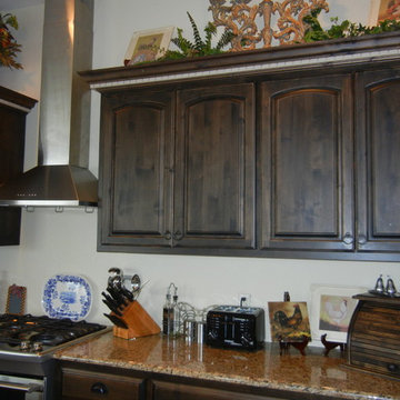 Distressed black walnut stain with cream island