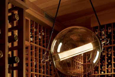 Inspiration for an eclectic wine cellar remodel