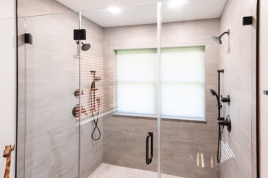 Mid-sized master beige tile double-sink walk-in shower photo in Other with blue cabinets, a one-piece toilet, a drop-in sink and a built-in vanity