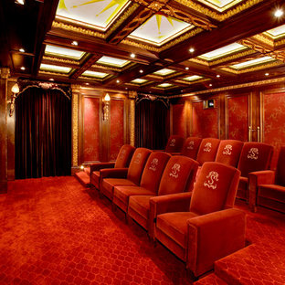 Elegant red floor home theater photo in Austin