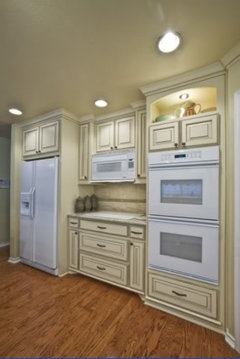 off white kitchen cabinets with white appliances