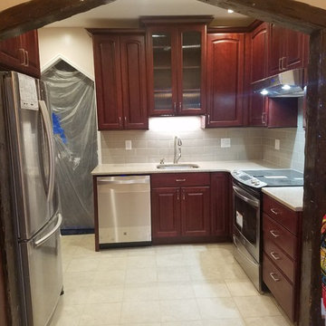 Rich "Burgundy" traditional kitchen in private house.