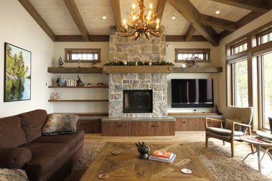 Inspiration for a large rustic formal and open concept light wood floor and beige floor living room remodel in Other with beige walls, a standard fireplace, a stone fireplace and a media wall
