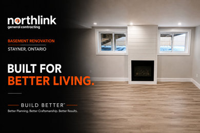 Minimalist basement photo in Toronto