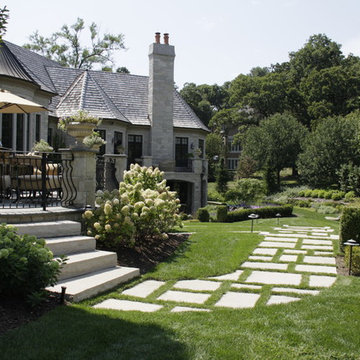 Full Landscape with Patio, Outdoor Kitchen, Stone Driveway and Planting