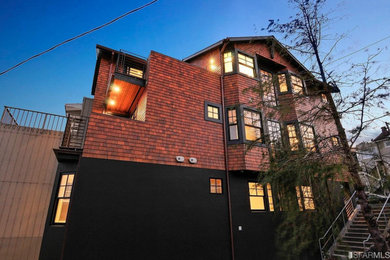 Example of a large minimalist four-story shingle exterior home design in San Francisco
