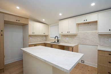 Farmhouse home design photo in Toronto