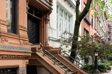 Example of an arts and crafts exterior home design in New York