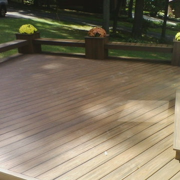 Ground level deck with planters