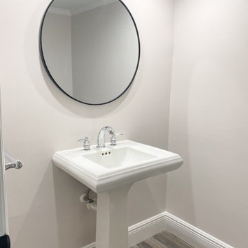 Powder Bathroom: Modern Coastal Condo Transformation