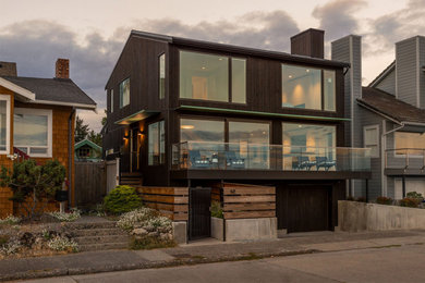 Example of a beach style exterior home design in Seattle
