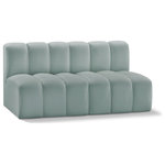 Meridian Furniture - Arc Vegan Leather Upholstered 2-Pc. Modular Sofa, Green - Unleash modern opulence with the Arc Vegan Leather 2pc. Sectional. Crafted for the modern connoisseur, this Sectional injects an air of refined luxury into any space. Its sleek silhouette, upholstered in supple mint green vegan leather, exudes timeless sophistication while the deep channel tufting adds textural intrigue, further elevating the chair's visual appeal. The modular design makes it a versatile chameleon, effortlessly adapting to your evolving needs and preferences. Whether you envision it gracing a chic living room corner, basking in the glow of a bedroom window, or adding a touch of drama to a home office, the Arc seamlessly complements your unique interior aesthetic.