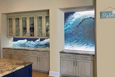 Inspiration for a large coastal home bar remodel in Orange County
